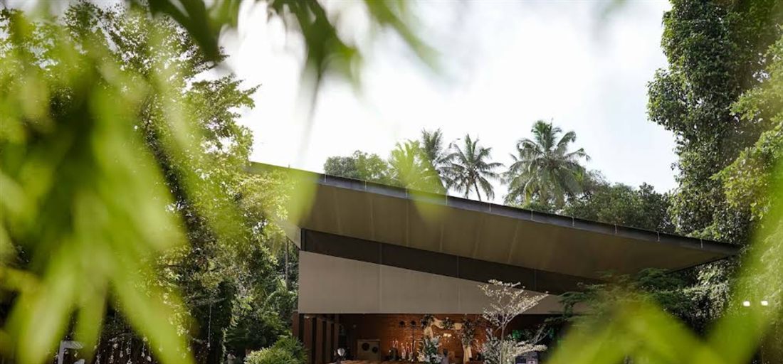 PM Palace, the wedding venue, set among coconut palms